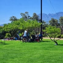 Guests gathered on the WildWind lawn for a relaxed outdoor day