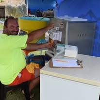 WildWind staff member at the reception counter ready to welcome guests